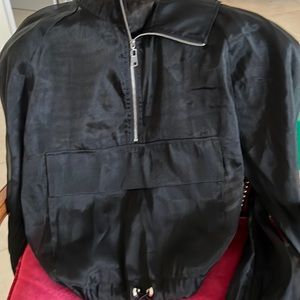 Black sheer jacket. Great for any look. Dress over bralettes or the gym.